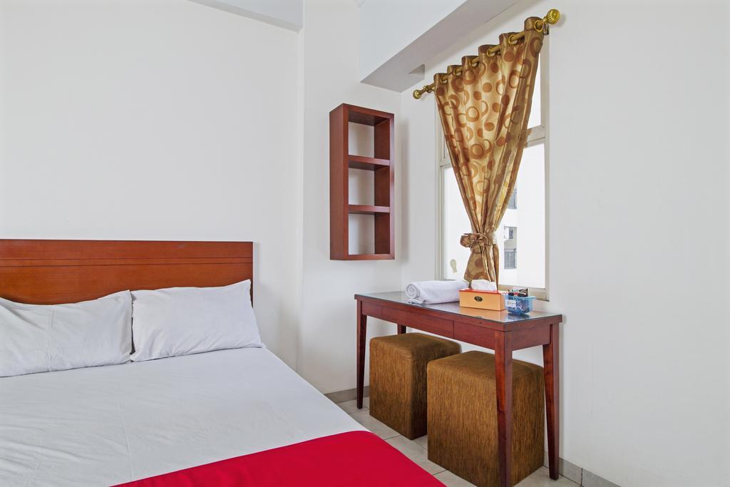 דפוק Reddoorz Apartment @ Margonda Residence מראה חיצוני תמונה
