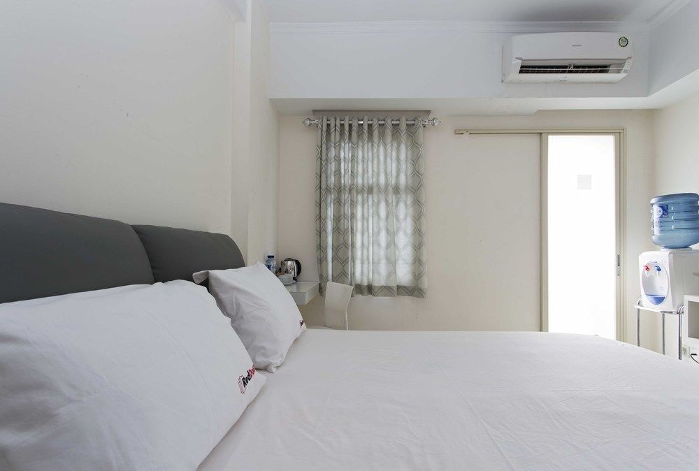 דפוק Reddoorz Apartment @ Margonda Residence מראה חיצוני תמונה