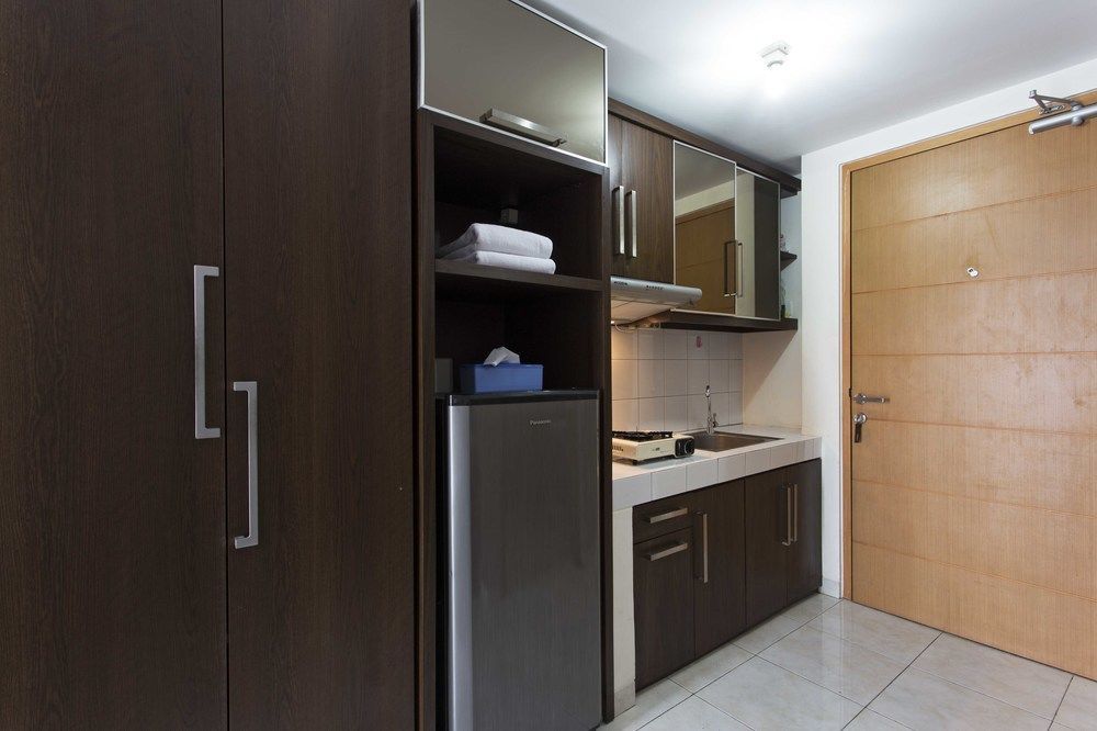 דפוק Reddoorz Apartment @ Margonda Residence מראה חיצוני תמונה
