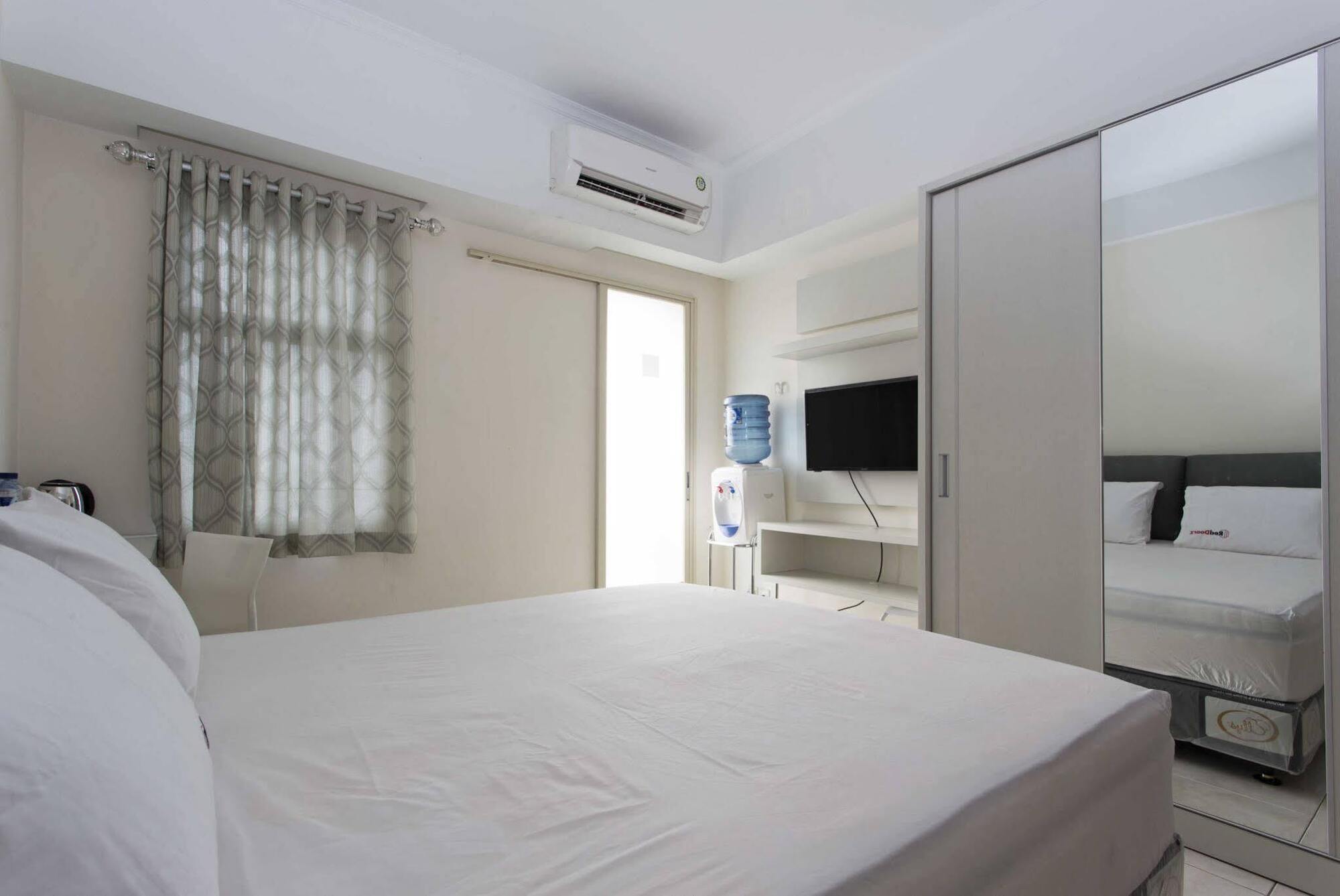 דפוק Reddoorz Apartment @ Margonda Residence מראה חיצוני תמונה